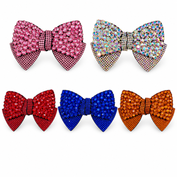 Diamante Hair Bow in pink, AB crystal, red, blue and orange on a white background